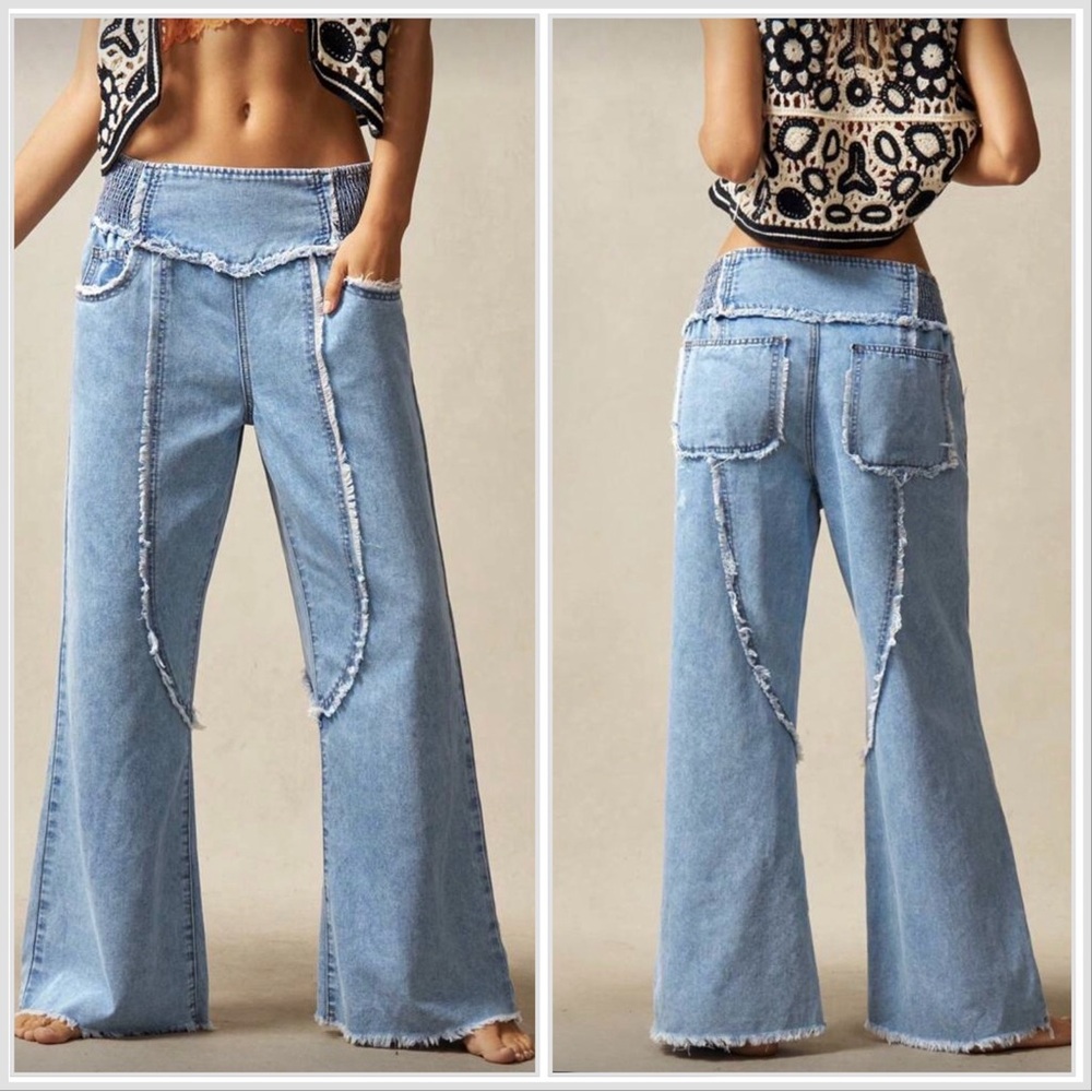 Frayed Light Blue Wide-Leg Jeans with Decorative Seam Detail